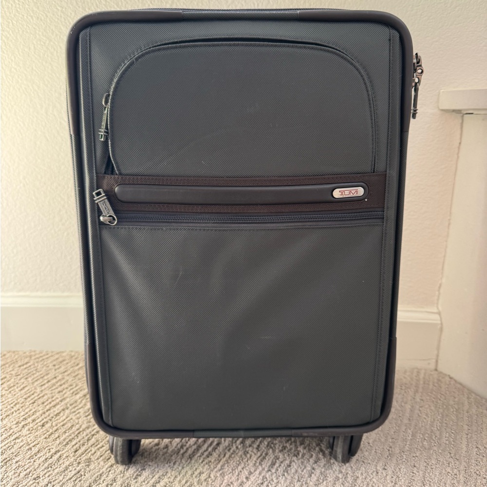 Tumi 4 wheel expandable international carry on
